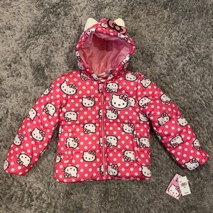 New with tags Hello Kitty kids pink puffer jacket with polka dots, size 5/6